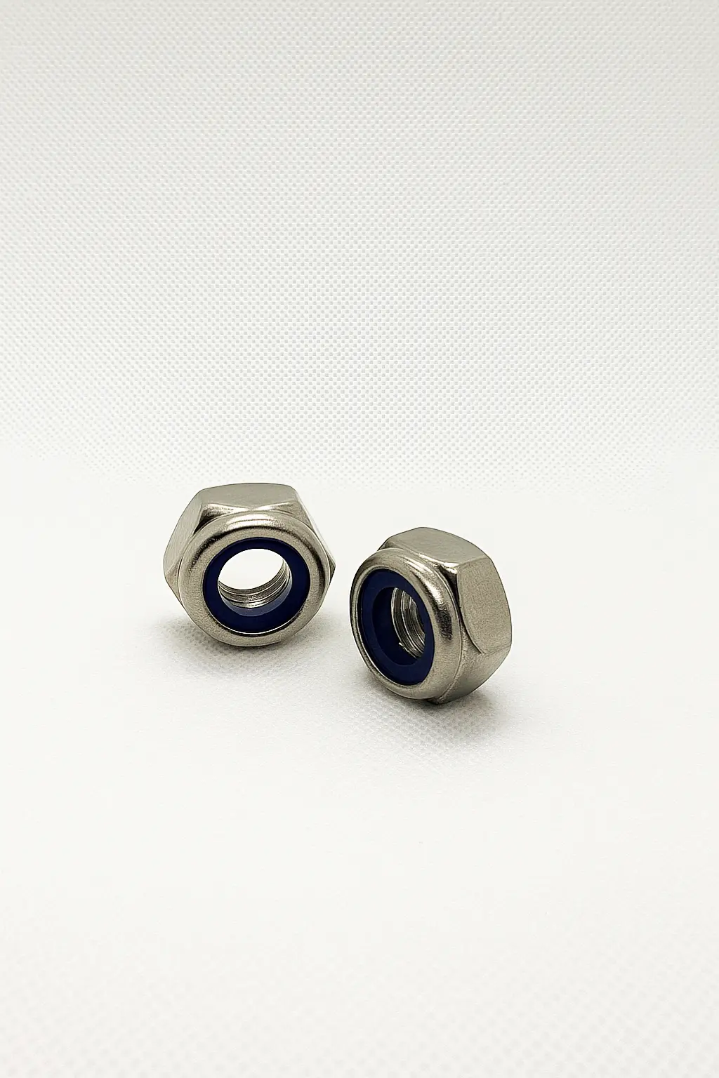 SpringFixUk M10 A2 stainless steel nyloc lock nuts with blue nylon insert, DIN 985 standard, pack of 10.
