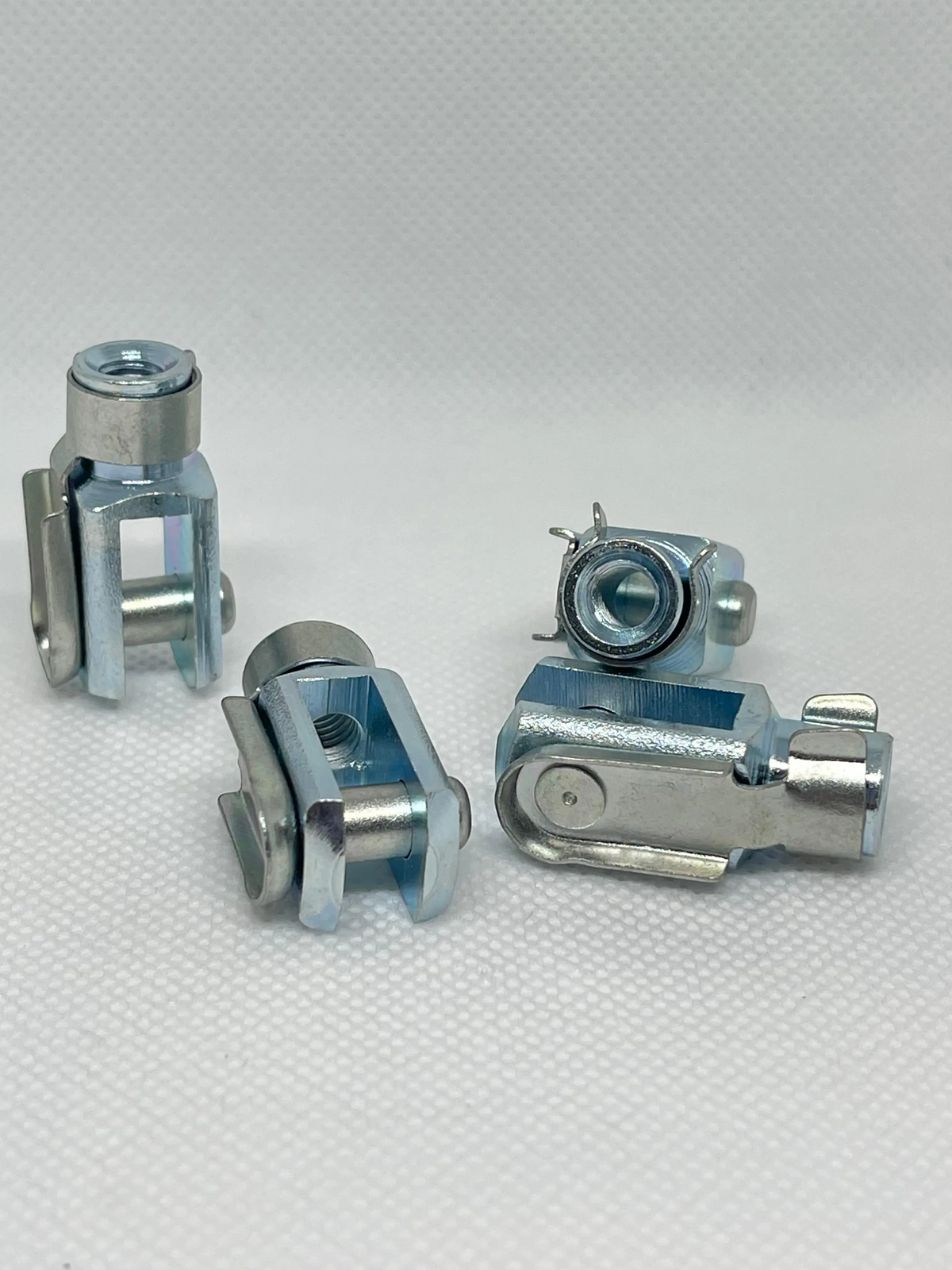 M6 zinc plated steel clevis fork ends with spring clips, DIN 71752 compliant | SpringFix UK