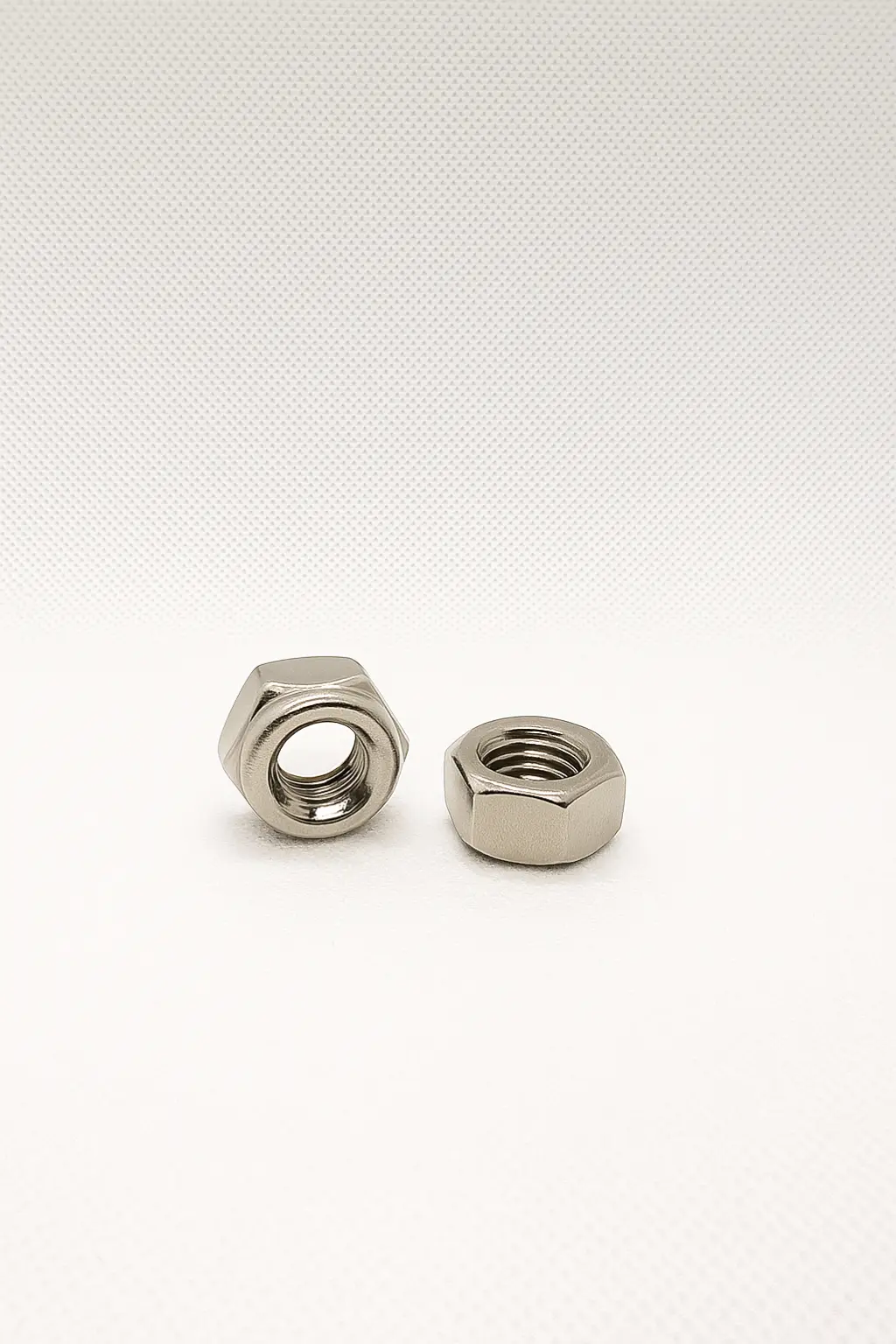 M8 A2 stainless steel hex nuts, DIN 934 standard, corrosion-resistant, ideal for machinery and outdoor use | SpringFix UK