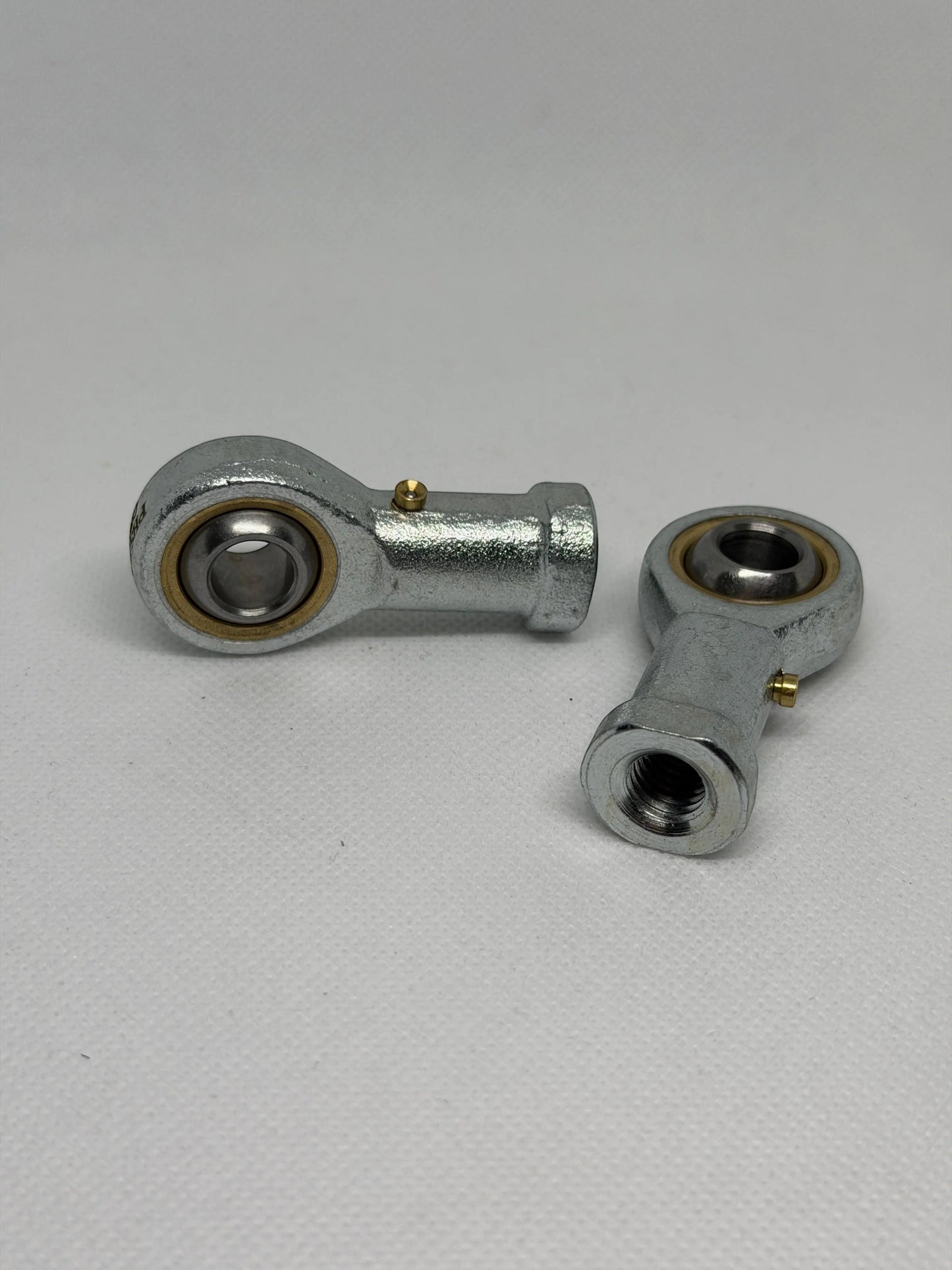 SpringFixUK pair of PHS10 M10 female rod end bearings with 10mm bore and right-hand thread, zinc-plated steel.