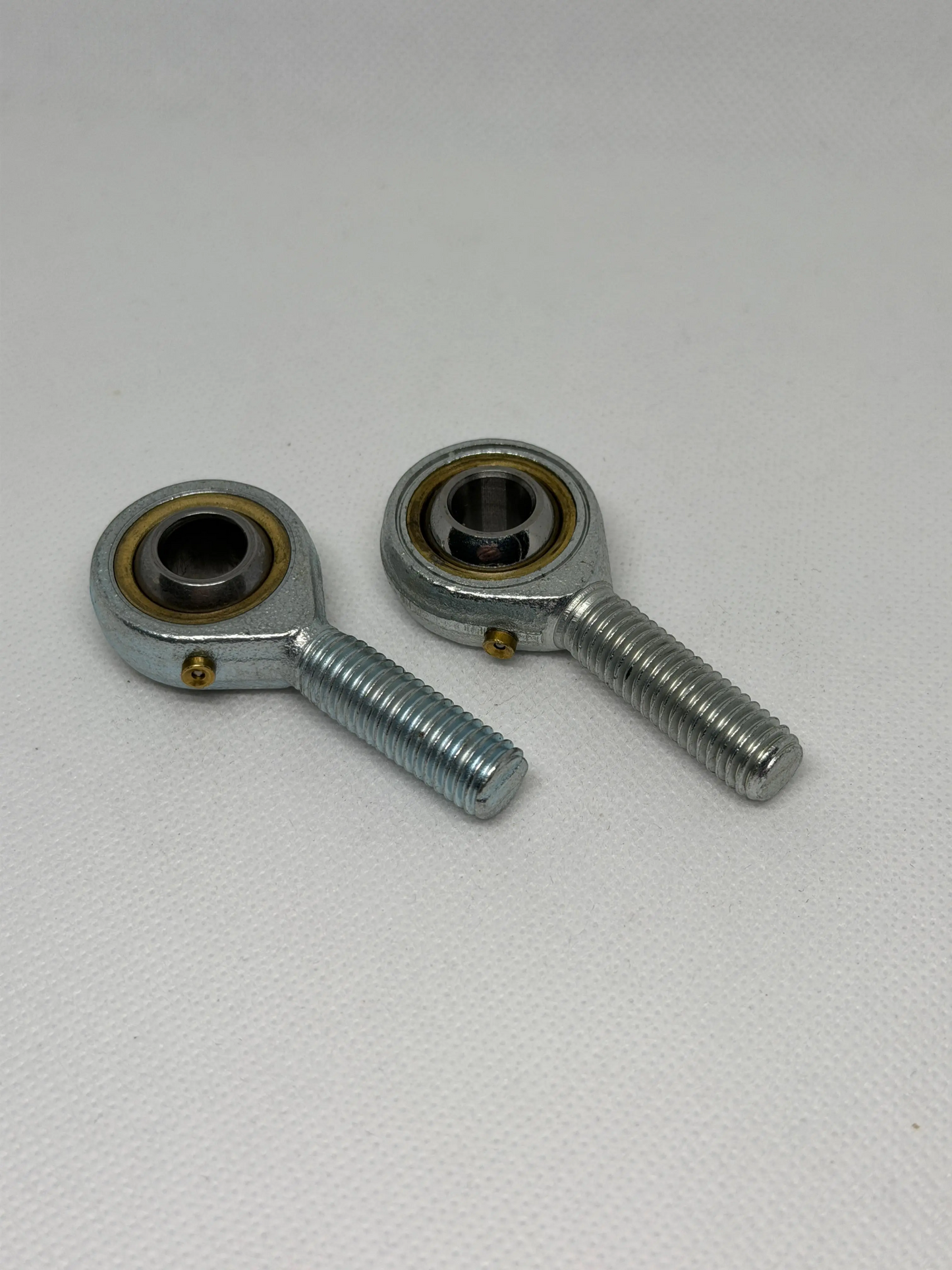 SpringFixUK pair of POS10 M10 male rod end bearings with 10mm bore, steel construction, zinc-plated finish.
