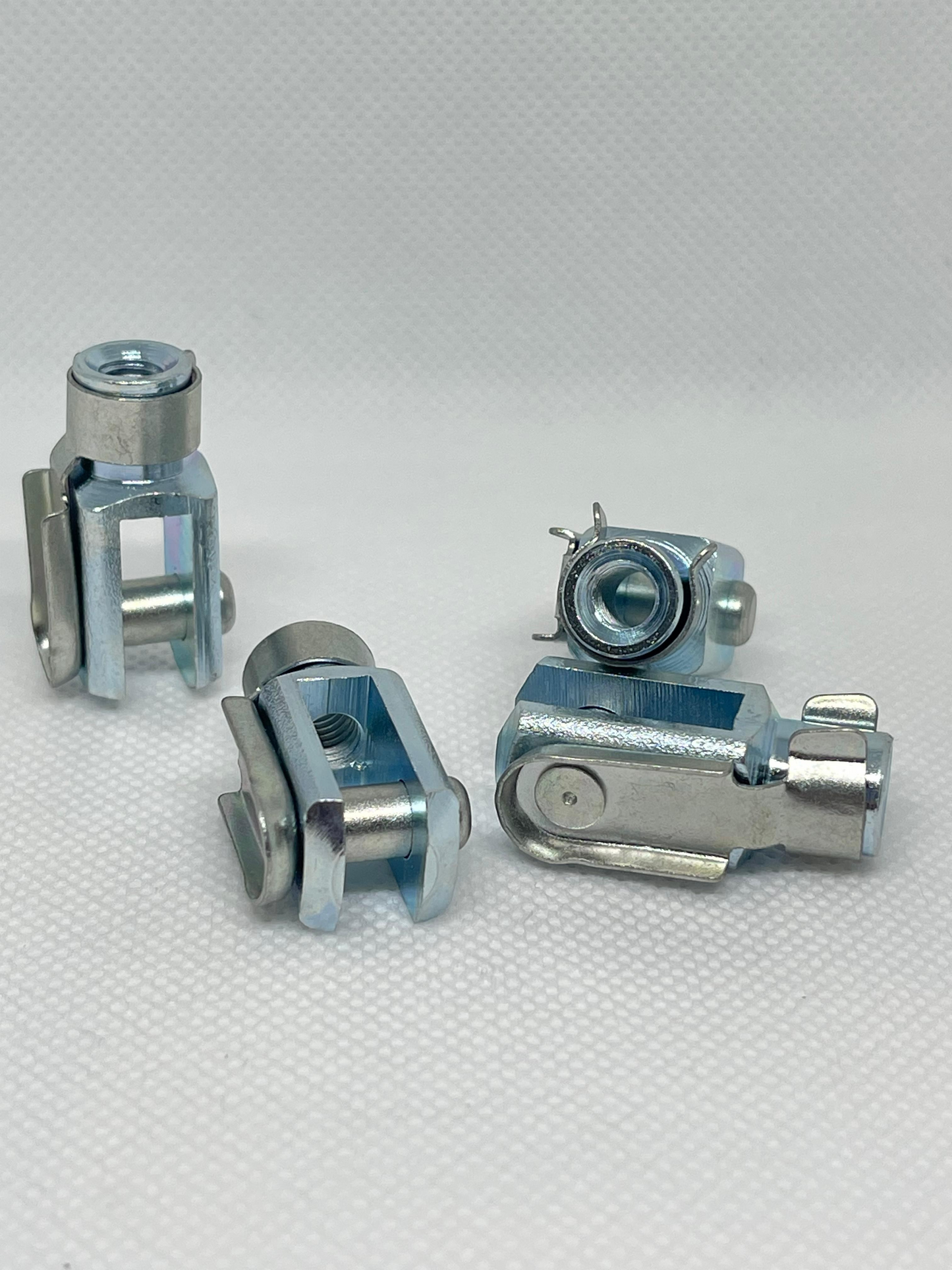 SpringFixUk M6 zinc plated steel clevis fork ends with spring clips, DIN 71752 compliant.
