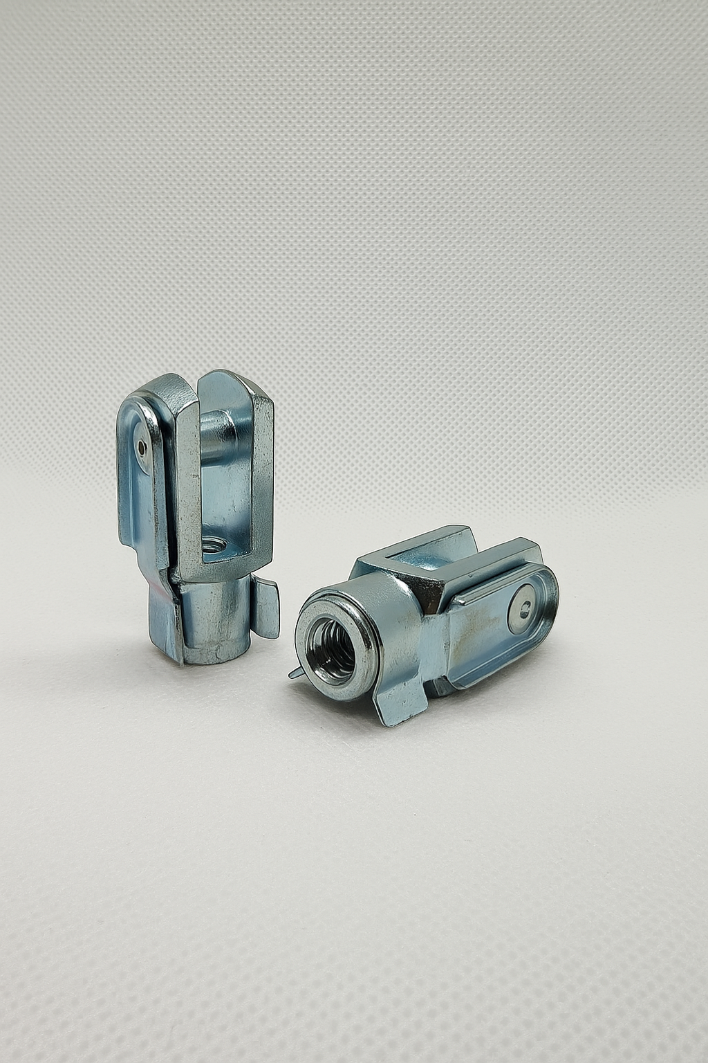 SpringFixUk M6 zinc plated steel clevis fork ends with spring clips, DIN 71752 standard, for gas struts and linkages.